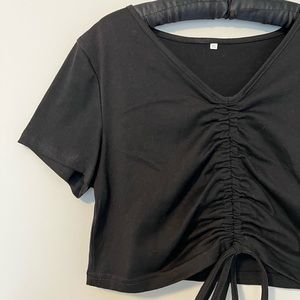 Black ruched crop top.